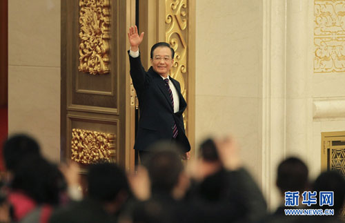 Chinese Premier Wen Jiabao meets the press after the closing meeting of the Fifth Session of the 11th National People's Congress (NPC) at the Great Hall of the People in Beijing, March 14, 2012.