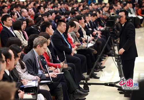 Chinese Premier Wen Jiabao meets the press after the closing meeting of the Fifth Session of the 11th National People's Congress (NPC) at the Great Hall of the People in Beijing, March 14, 2012.