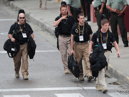 U.S. secret service agents walk around the Convention Center in Cartagena, Colombia, prior to the opening ceremony of the 6th Summit of the Americas at the Convention Center in Cartagena, Colombia, Saturday, April 14, 2012. [Agencies]