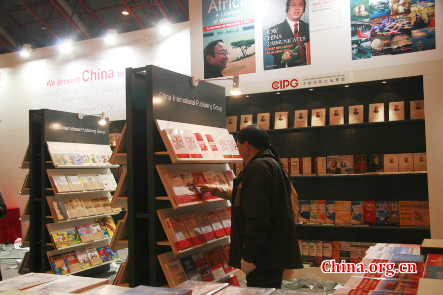 CIPG staff arrange the books that will be on display during the London Book Fair. 