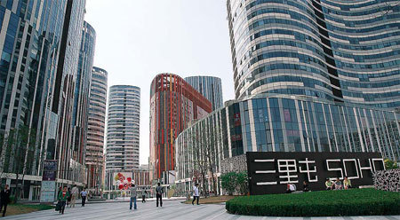 A SOHO China Ltd development in Beijing's Sanlitun area. The commercial property developer purchased the equity interests of a lot in Shanghai from Greentown China Holdings Ltd for 2.14 billion yuan ($340 million). [China Daily]