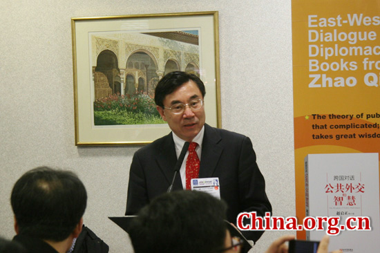 Huang Youyi, vice president of China International Publishing Group (CIPG), hosts Zhao Qizheng's books launch ceremony at Piccadilly Room of Earls Court Exhibition Hall on April 17, 2012.