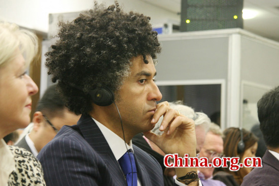 Sameh EI-Shahat, president of China-I Ltd., listens in at Zhao Qizheng's book launch on April 17, 2012.
