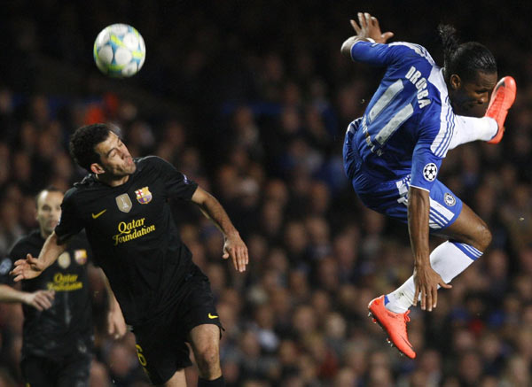 Chelsea and Drogba make wasteful Barca pay