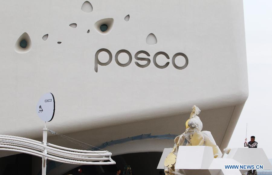A labor works outside of the posco pavilion of the International Exposition Yeosu Korea 2012 in Yeosu, South Korea, on April 20, 2012. Expo 2012 Yeosu Korea Organizing Committee held a press conference on the preparation of the Expo to the foreign media in Yeosu on Friday. This Expo, whose theme is 'The Living Ocean and Coast', is scheduled to be held in Yeosu from May 12 to August 12, 2012. [Xinhua]
