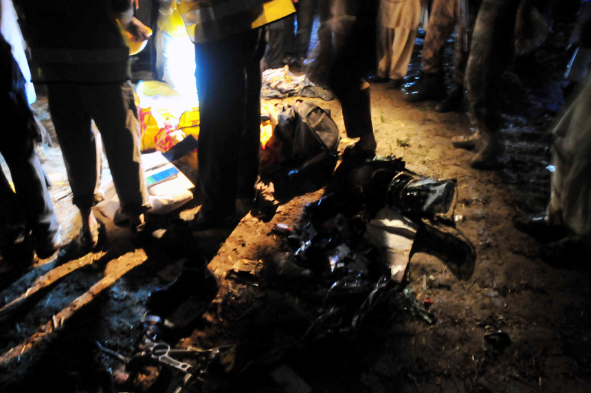 Rescuers work at the crash site on the outskirts of Rawalpindi, adjacent city to Islamabad, Pakistan, on April 20, 2012. A passenger plane crashed near Islamabad Friday evening, killing all 127 people on board, the Pakistani aviation authorities and Defence Ministry said. [Xinhua photo]