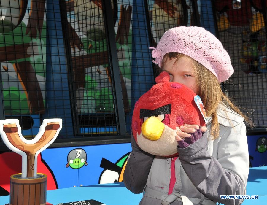 A girl visits the Angry Birds Land built in Sarkanniemi Adventure Park, Tampere, Finland, April 25, 2012. 