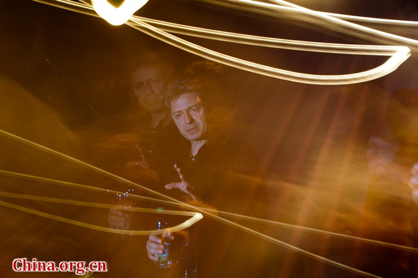 Juan Napier, director of Madam Butterfly 3D, a film that displays the Royal Opera House&apos;s live performance of the Italian composer Giacomo Puccini&apos;s opera, meets the press during the 2nd Beijing International Film Festival. [Chen Boyuan / China.org.cn]