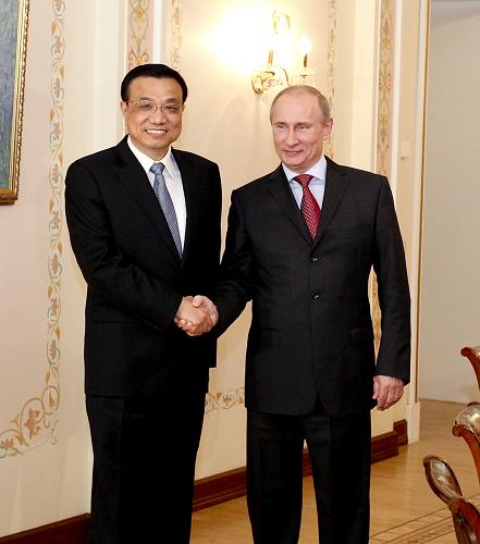 Chinese Vice Premier Li Keqiang meets with Russian Prime Minister and President-elect Vladimir Putin. [Xinhua] 