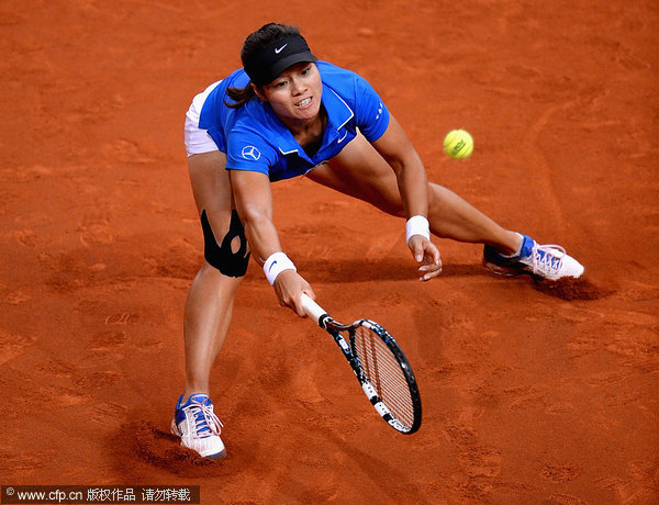 Li Na stunned by Radwanska