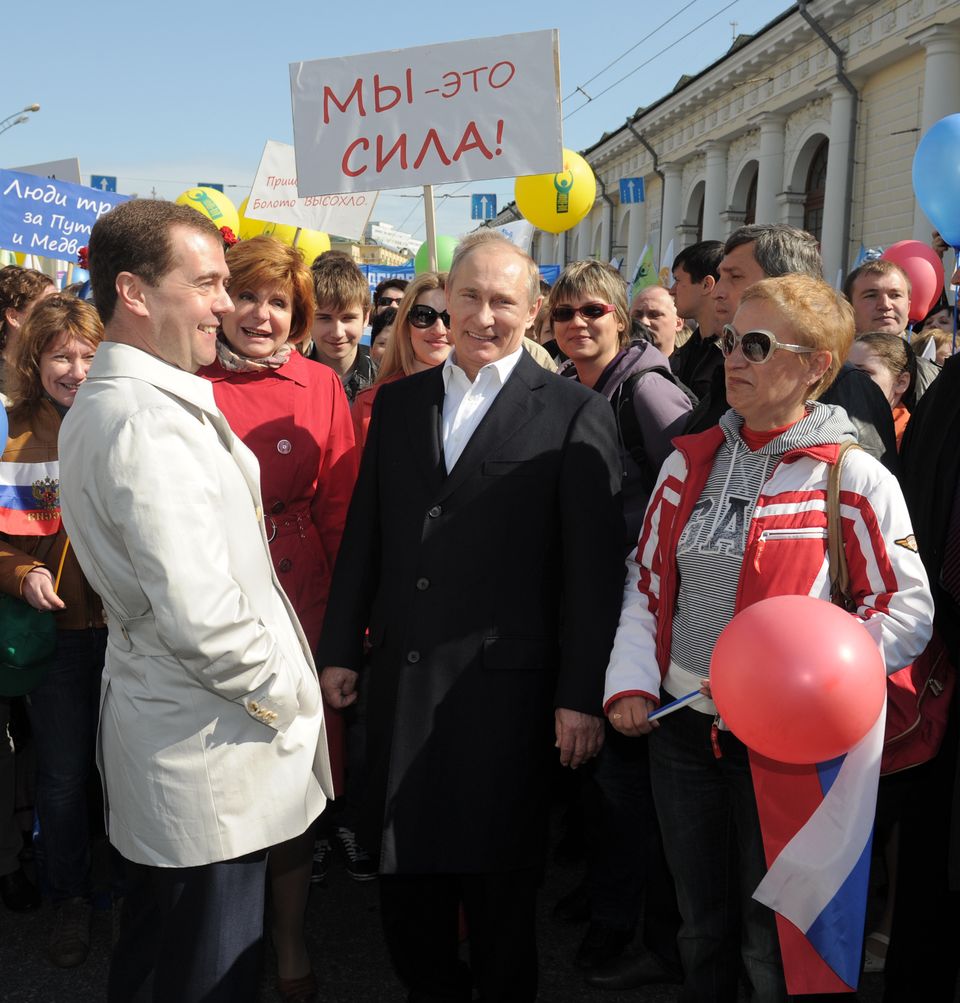 Russian President Dmitry Medvedev and President-elect Vladimir Putin attended a 150,000-people march in Moscow on Tuesday to mark the International Workers' Day, or May Day. 