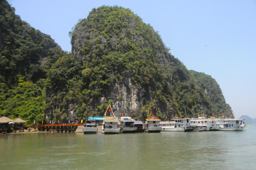 Ships anchor at Vinh Ha Long, a beautiful scenic spot of Vietnam, on May 1, 2012. Ha Long Vinh attracted 24,000 tourists home and abroad on April 29, according to local statistics. (Xinhua/Li Dan) 