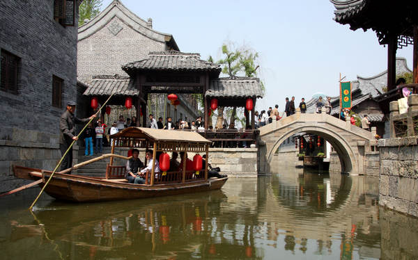 Taierzhuang, famous for its historic sites, has attracted millions of tourists. The local government rebuilt the ancient town by restoring these sites in 2009. The admission price has now more than tripled from its opening of 50 yuan two years ago. Ji Zhe / for China Daily
