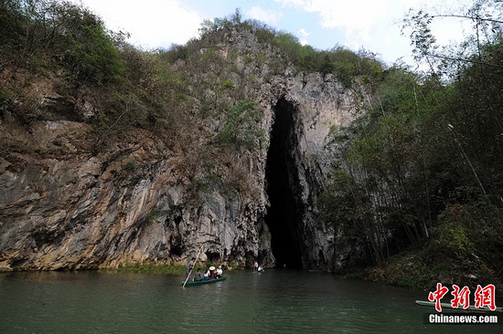 The cave waterway - a necessary pass to the village. (CNS Photo/Ren Dong) 