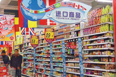 Shoppers at the imported products section of a supermarket in Huaibei, Anhui province. [China Daily]