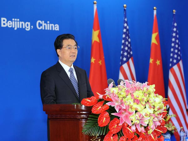 Chinese President Hu Jintao (C) addresses the opening session of the fourth round of the China-U.S. Strategic and Economic Dialogue in Beijing, capital of China, May 3, 2012. [Xie Huanchi/Xinhua] 