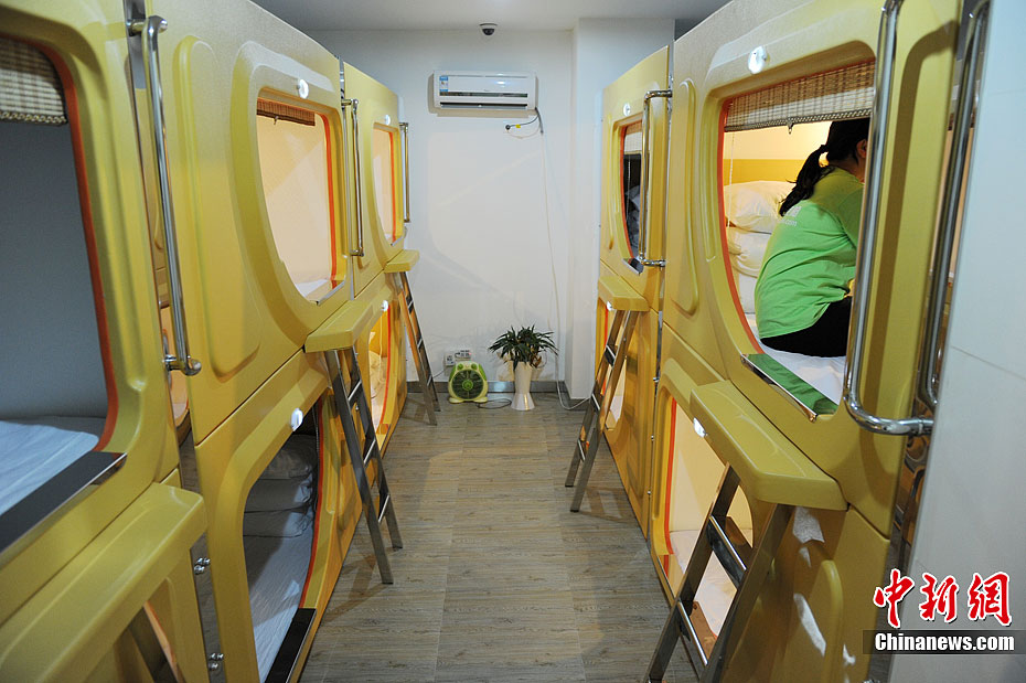 China's first 'space capsule' hotel with business license opened to public in Xi'an, capital city of north western Shaanxi province on May 1. It gets very popular. The hotel includes 86 'capsule'in nine areas in accordance with the 12 constellations, among others, the ‘Leo' capsules are reserved for those who snore.