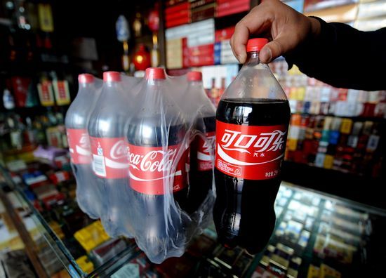 Coca Cola sorry over handling of drinks scare