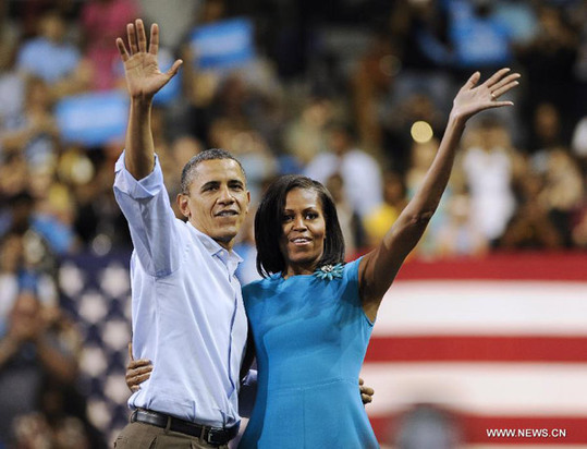 U.S. President Barack Obama (L) and First Lady Michelle Obama attend a campaign event at Virginia Commonwealth University in Richmond, Virginia, the United States, May 5, 2012. [Xinhua]