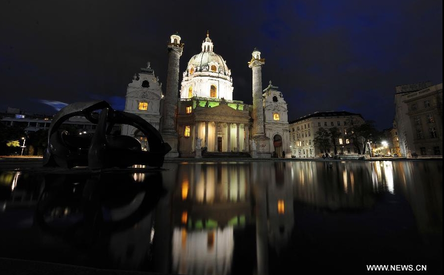  The St. Charles's Church is seen at night in Vienna, Austria, May 5, 2012. The church, built in 1737, is one of the most outstanding baroque church structures, and boasts a dome in the form of an elongated ellipsoid. (Xinhua/Xu Liang) 