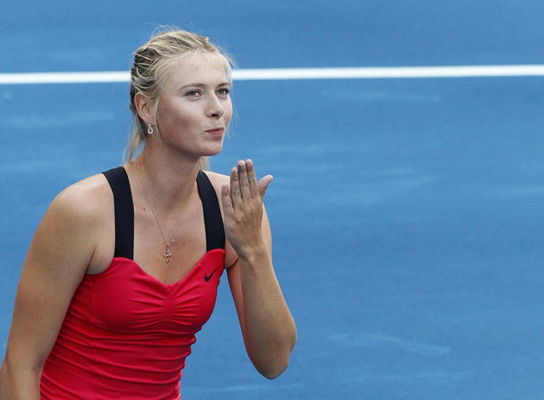 Azarenka, Sharapova advance in Madrid