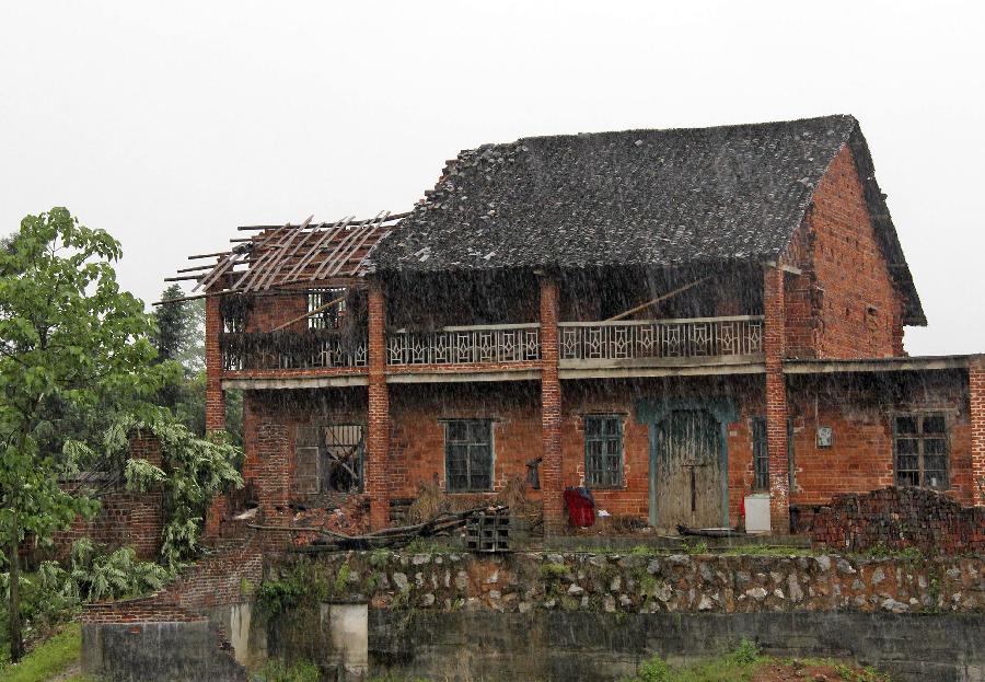 Photo taken on May 9, 2012 shows a damaged house in Changxi Village of Anping Township in Loudi, central China's Hunan Province. 