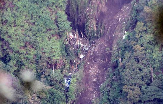 The logo of Sukhoi Co. is clearly visible, center, bottom, among the wreckage of a Sukhoi Superjet-100 scattered on the mountainside in Bogor, West Java, Indonesia, Friday, May 11, 2012.
