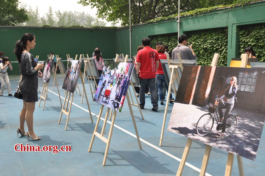 A photo exhibition depicting cyclists in Denmark's capital city. The Embassy of Denmark in China organized an open-door event in Beijing on May 13, 2012, in order to provide visitors with a genuine taste of Danish culture. More than 2,000 people, including foreign dignitaries, 13 Danish brands and companies and about 1,500 micro-bloggers from weibo.com participated in the event. 