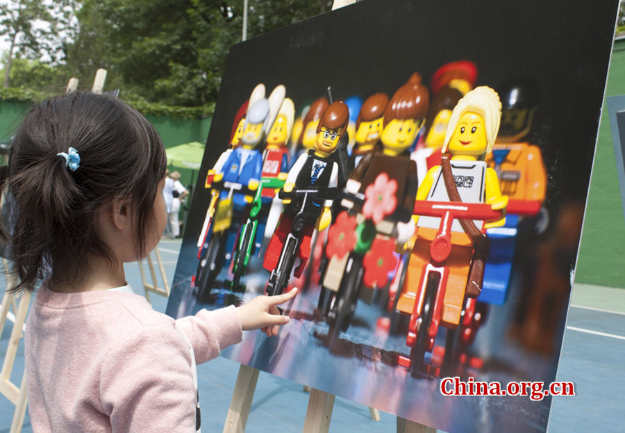 A photo exhibition depicting cyclists in Denmark's capital city. The Embassy of Denmark in China organized an open-door event in Beijing on May 13, 2012, in order to provide visitors with a genuine taste of Danish culture. More than 2,000 people, including foreign dignitaries, 13 Danish brands and companies and about 1,500 micro-bloggers from weibo.com participated in the event. 