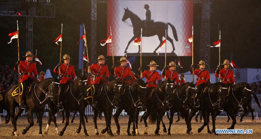 The Royal Canadian Mounted Police perform during the Diamond Jubilee Pageant in Windsor Horse Show in London, Britain, May 12, 2012.