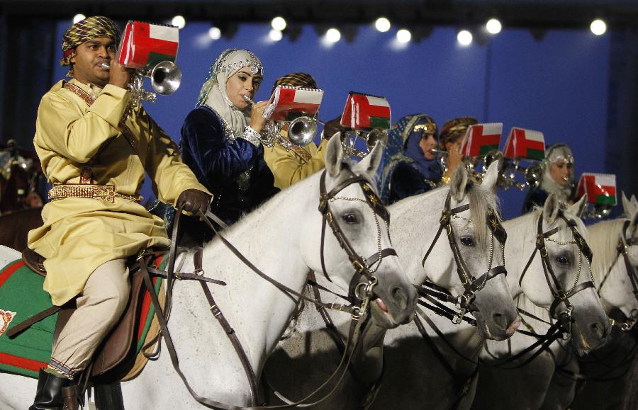 Oman riders perform during the diamond jubilee pageant of Windsor Horse Show in Windsor, Britain on May 12, 2012. (Xinhua/Wang Lili) 