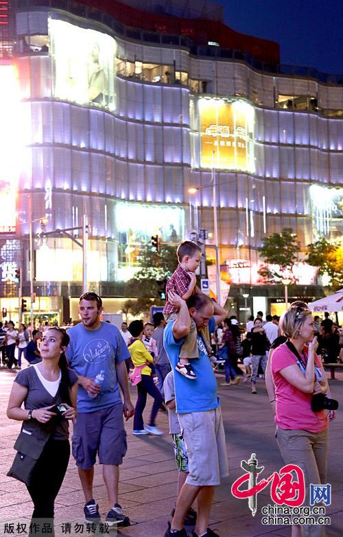 Described by some as the 5th Avenue of China, Wangfujing has long been Beijing's top international street. Just a short slide down from the Forbidden City, Wangfujing is a melting pot of culture and architecture with some of the city's most famous shops. 