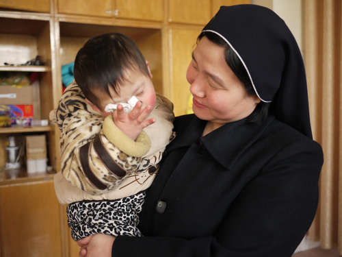 A Catholic nun and her team provide round-the-clock care for orphans with special needs at a Hubei village, Tom McGregor discovers.