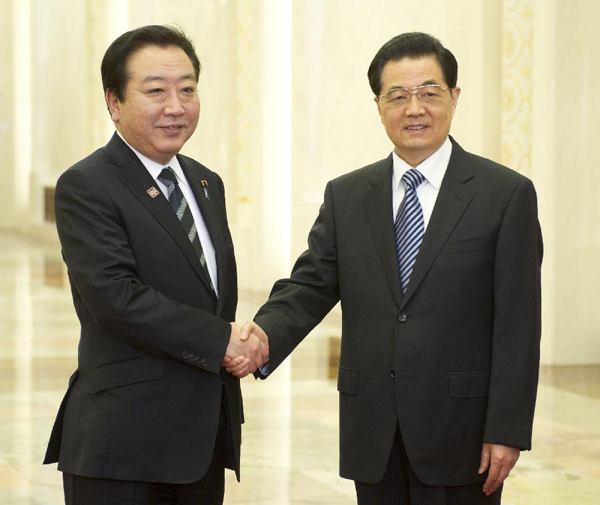 Chinese President Hu Jintao (R) meets with Japanese Prime Minister Yoshihiko Noda at the Great Hall of the People in Beijing on May 14, 2012. Noda is in Beijing to attend the Fifth Trilateral Summit Meeting among China, Japan and the Republic of Korea. 