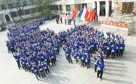 About 1,000 students formed a human water dragon at Beijing Bayi High School as part of a movement to call for water conservation and the consumption of water-sustainable products. [China Daily] 