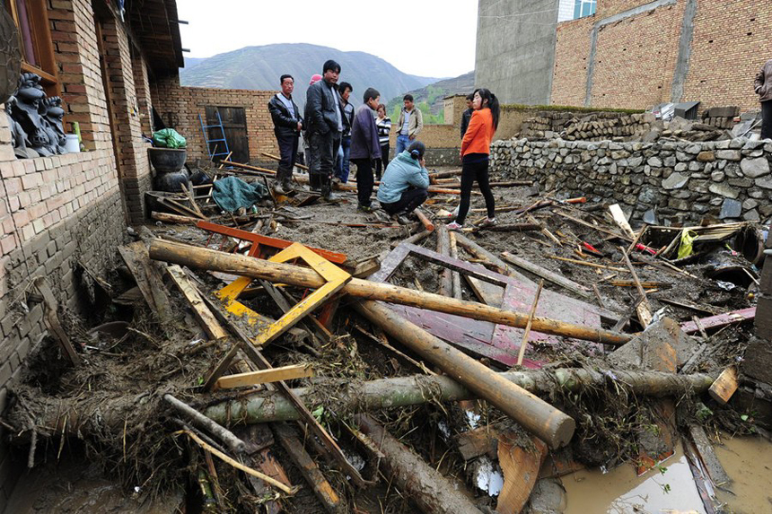 Authorities in northwest China have reported 53 deaths and 18 people missing as of 4 p.m. Monday as a result of hail and torrential rains that battered two mountainous counties in the region last week. [Xinhua photo]