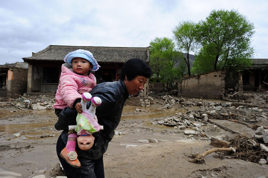 Authorities in northwest China have reported 53 deaths and 18 people missing as of 4 p.m. Monday as a result of hail and torrential rains that battered two mountainous counties in the region last week. [Xinhua photo]