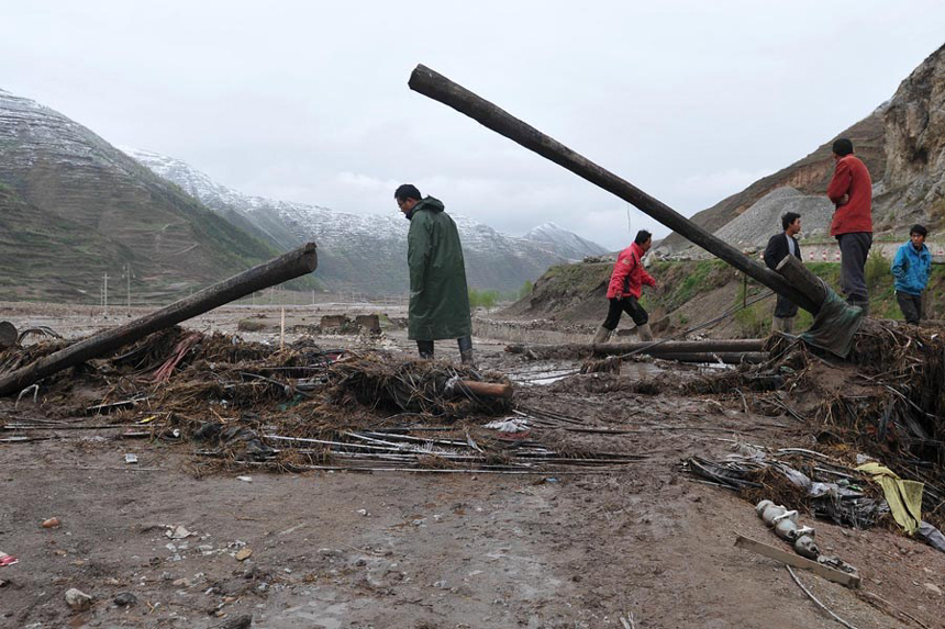 Authorities in northwest China have reported 53 deaths and 18 people missing as of 4 p.m. Monday as a result of hail and torrential rains that battered two mountainous counties in the region last week. [Xinhua photo]