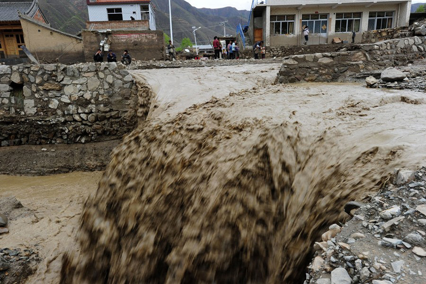 Authorities in northwest China have reported 53 deaths and 18 people missing as of 4 p.m. Monday as a result of hail and torrential rains that battered two mountainous counties in the region last week. [Xinhua photo]