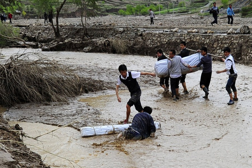 Authorities in northwest China have reported 53 deaths and 18 people missing as of 4 p.m. Monday as a result of hail and torrential rains that battered two mountainous counties in the region last week. [Xinhua photo]