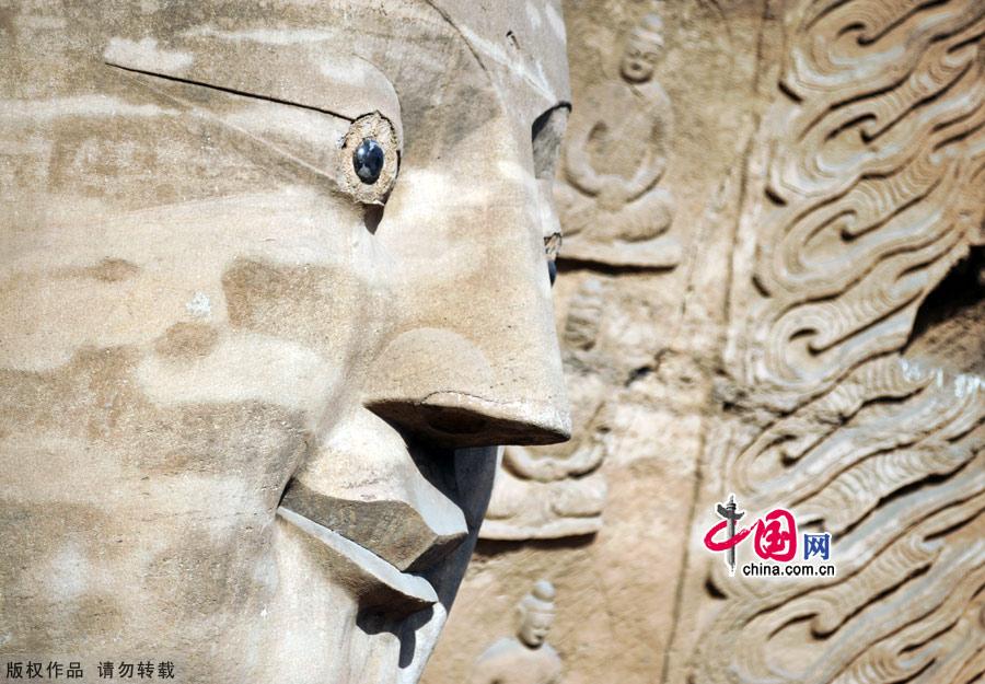 Located at the southern foot of Wuzhou Mountain 16 kilometers west of Datong, Shanxi Province, the Yungang Grottoes were built against the mountain and extend about 1 kilometer from east to west. 