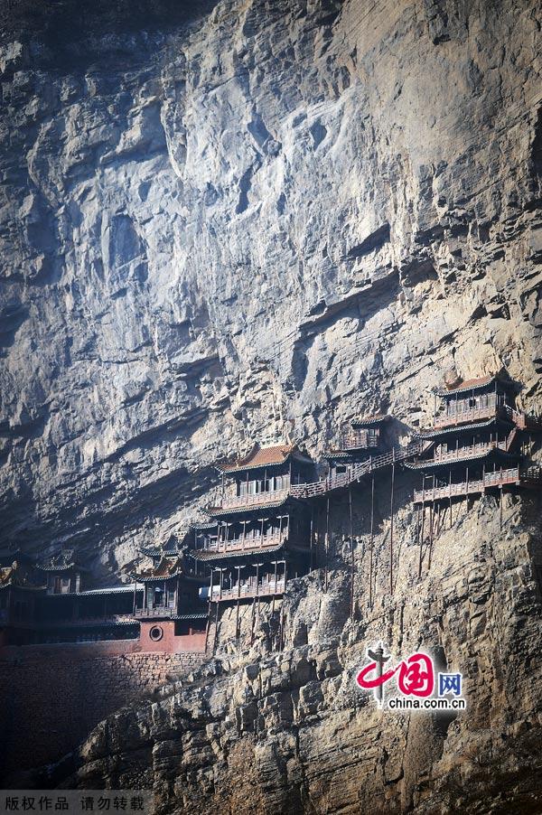 Hanging Temple in Hunyuan county which was built during the latter period of Northern Wei Dynasty with a history of more than 1,400 years, is the only existing temple of Buddhism, Taoism and Confucianism. The temple is located halfway up Mt. Cuiping and across from Mt. Hengshan with the cliffs below.