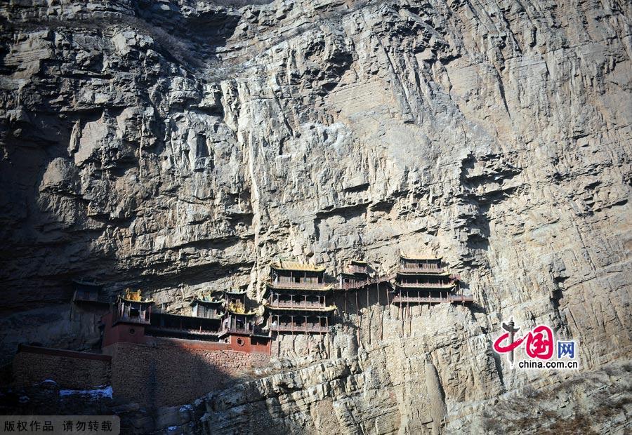 Hanging Temple in Hunyuan county which was built during the latter period of Northern Wei Dynasty with a history of more than 1,400 years, is the only existing temple of Buddhism, Taoism and Confucianism. The temple is located halfway up Mt. Cuiping and across from Mt. Hengshan with the cliffs below.