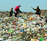 Trash hill casts shadow on village