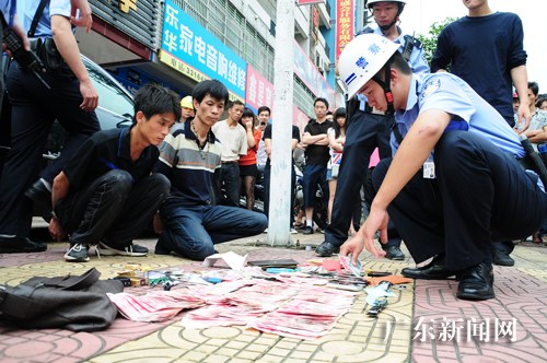 Police cracked a drug-related case captured 2 suspects in Guangzhou, Guangdong Province on May 12, 2012. 