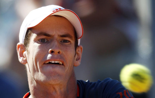 Murray suffers setback, Williams sisters win