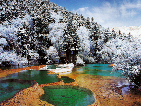 Huanglong, one of the 'top 10 attractions in Sichuan, China' by China.org.cn.