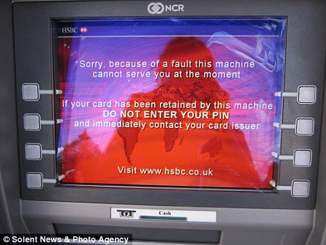Out of order: The cash machine in Milford-on-Sea, Hampshire, which was dishing out free money. [Agencies]