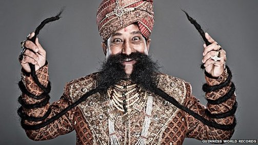 Ram Singh Chauhan of India has the world's longest mustache at 14 feet, according to the Guinness Book of World Records. [Agencies]