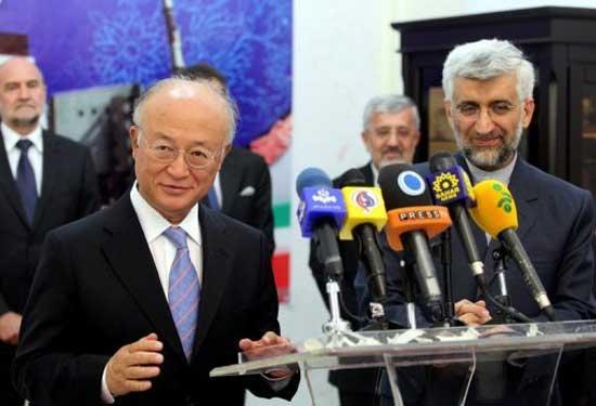 International Atomic Energy Agency (IAEA) chief Yukiya Amano (left) speaks during a press conference as Iran's chief nuclear negotiator Said Jalili (R) looks on in Tehran on Monday. Amano and Jalili hailed 'intensive' and 'very good' talks on Iran's nuclear programme, state television says. 